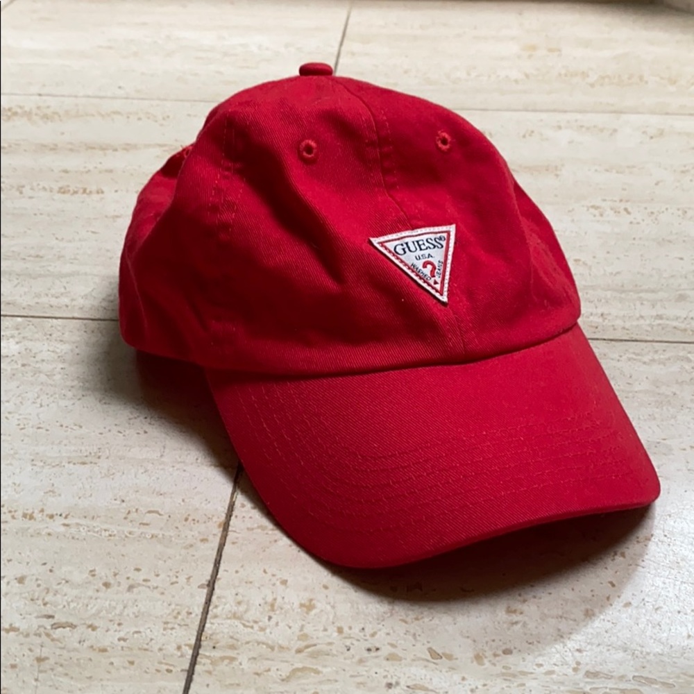 red guess hat